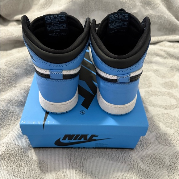 Nike Blue and Black Sneakers with High-Top Design and Perforated Toe Box - Picture 4 of 10